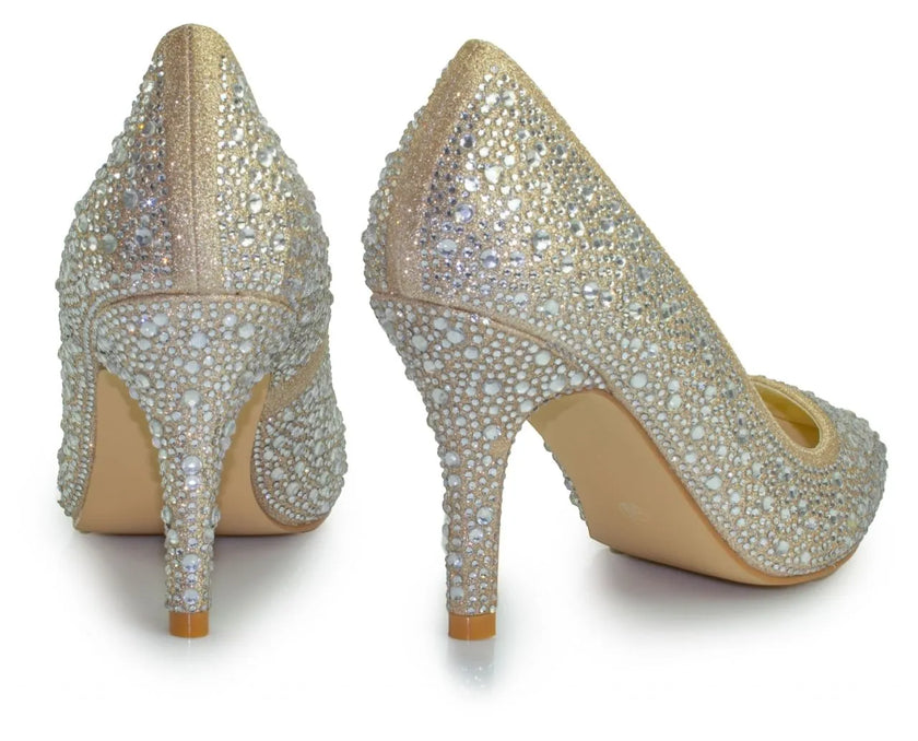 Zapatos de fiesta color champagne con tacón de 8 cm, detalles de strass y diseño clásico para bodas y eventos formales.